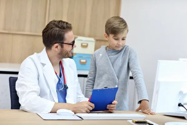 little-boy-in-clinic-having-a-checkup-with-pediatr-2026-01-07-06-01-15-utc-69b7f2b1e5c55